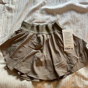 Lululemon court rival skirt size 0 color riverstone NWT